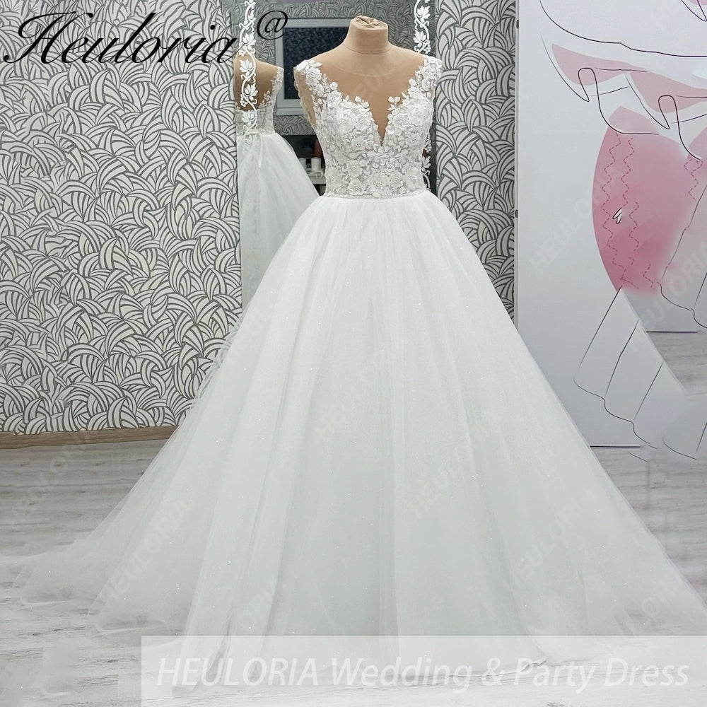 HEULORIA Shimmering Floral Lace Ball Gown Wedding Dress with Illusion V-Neck and Cathedral Train AL-1060
