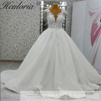 HEULORIA Enchanted Radiance: Plunging Illusion V-Neck Ball Gown Wedding Dress with Delicate Cap Sleeves BA-1075