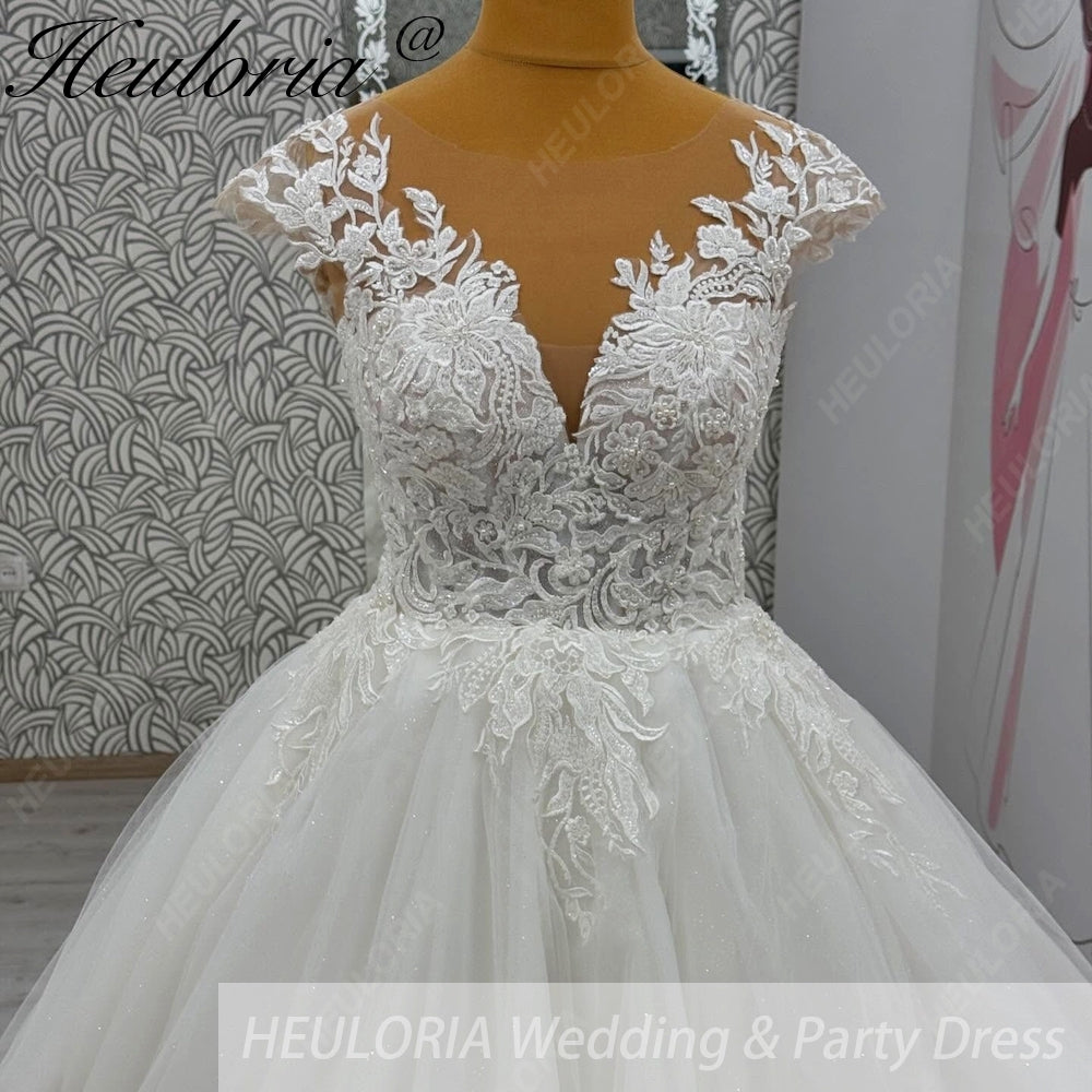 HEULORIA Ethereal Lace Appliqué Ball Gown: Illusion V-Neck & Scalloped Cap Sleeves BA-1090