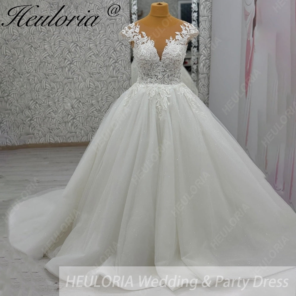 HEULORIA Ethereal Lace Appliqué Ball Gown: Illusion V-Neck & Scalloped Cap Sleeves BA-1090
