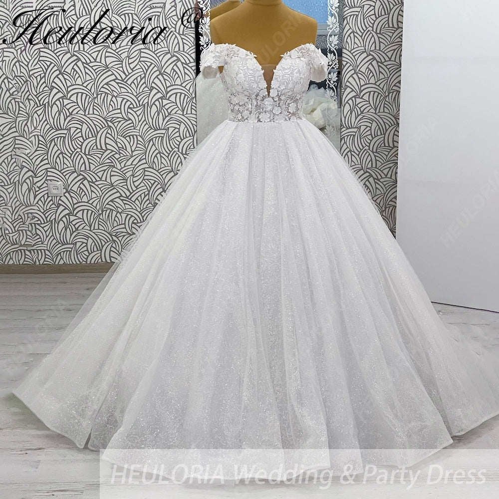 HEULORIA Sparkling Off-The-Shoulder 3D Floral Lace Ball Gown Wedding Dress with Deep V-Neckline BA-1245