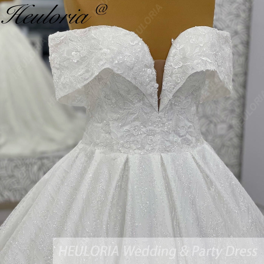 HEULORIA Shimmering Floral Lace Off-the-Shoulder Ball Gown Wedding Dress with Plunging Illusion V-Neck BA-1108