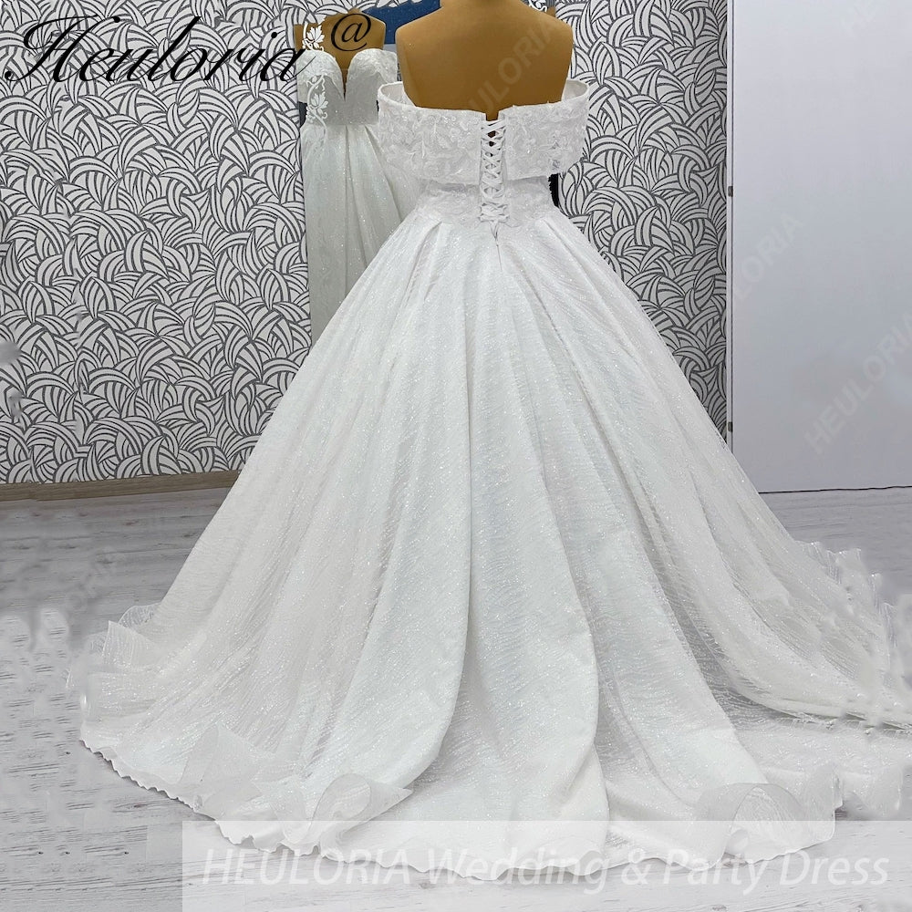 HEULORIA Shimmering Floral Lace Off-the-Shoulder Ball Gown Wedding Dress with Plunging Illusion V-Neck BA-1108