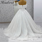HEULORIA Shimmering Floral Lace Off-the-Shoulder Ball Gown Wedding Dress with Plunging Illusion V-Neck BA-1108