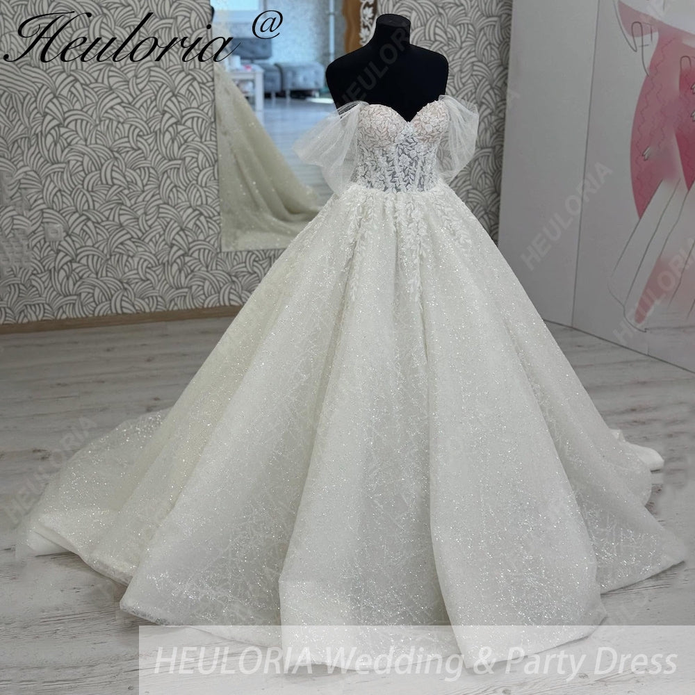 HEULORIA Sparkly Off-the-Shoulder Puff Sleeve Wedding Dress – Shimmering Lace Sweetheart Ball Gown BA-1076