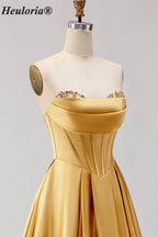 HEULORIA Strapless Golden Satin Ball Gown with Beaded Corset Bodice and Pleated Skirt ED-516