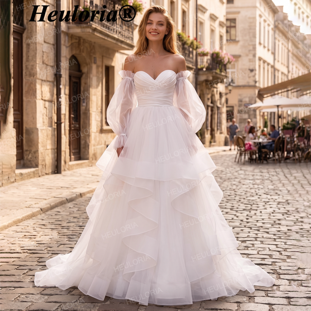HEULORIA Romantic Off-the-Shoulder Tulle A-Line Wedding Dress with Puff Sleeves & Tiered Skirt AL-QK209